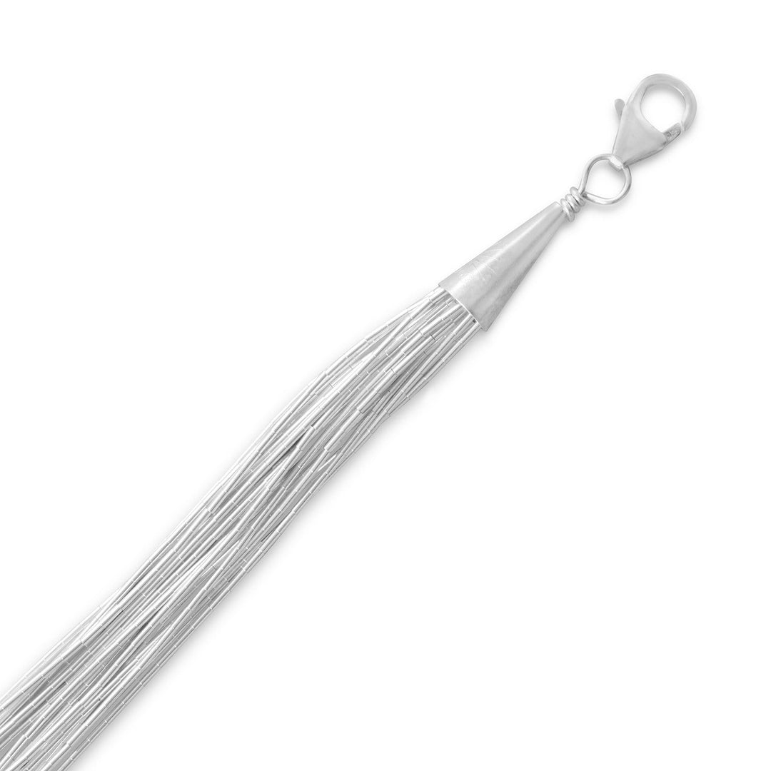 Behold the show-stopping 10 Strand Liquid Silver necklace or bracelet, a masterpiece crafted from .925 Sterling Silver for a premium finish. Its unique liquid silver design, with 10 strands of pure shimmer, is a sight to behold. This statement piece is sure to captivate all onlookers with its undeniable elegance. There are necklace and bracelet options in lengths of 18, 20, 22, 24, 30 inches, and 7 inches. Elevate your style with this timeless piece and enjoy its beauty for years to come.