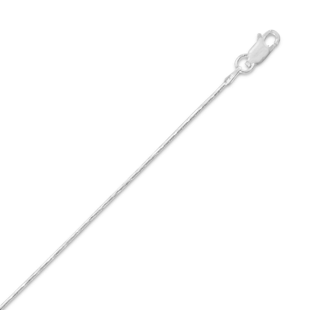 Behold our exquisite Sterling Silver Snake Chain Necklace, crafted in Italy with the finest .925 Sterling Silver. Measuring approximately 1 mm width, this chain boasts a sleek and elegant design that is sure to turn heads. Its unique construction, made up of small rings tightly woven together, creates a flexible and fluid texture that mimics the movement of a snake. Available in lengths of 16, 18, and 22 inches, this versatile piece is suitable for both men and women.