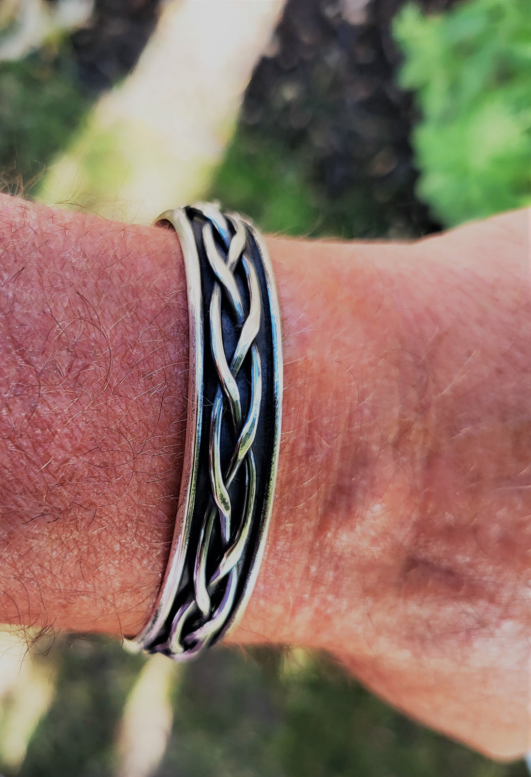 Man wearing the sterling silver cuff.