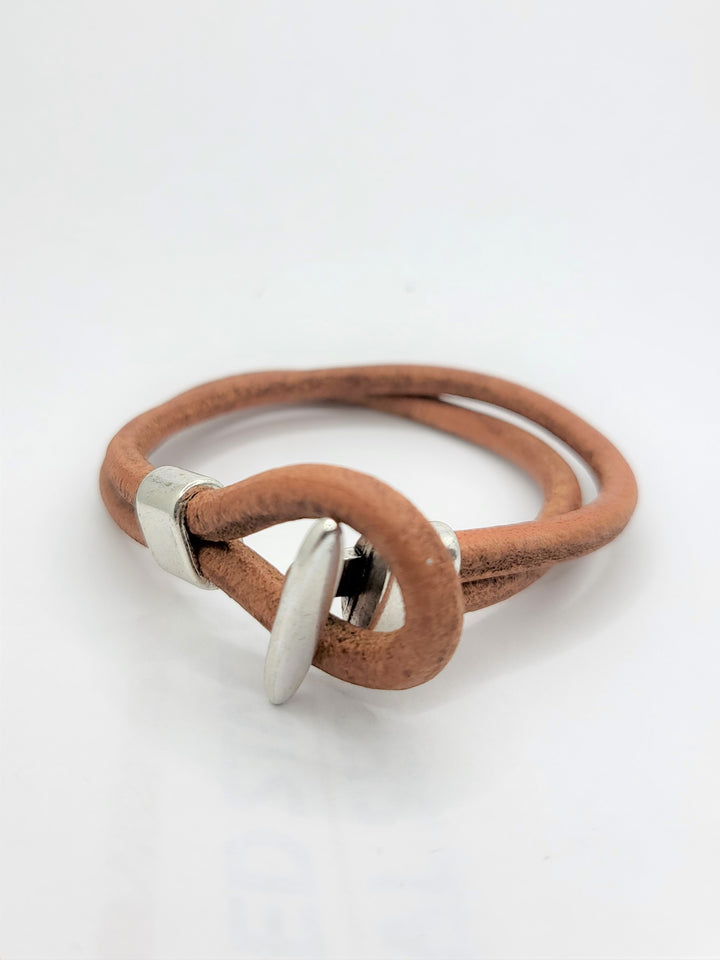 Rustic 9" double strand brown leather men's bracelet with silver tone T bar closure.