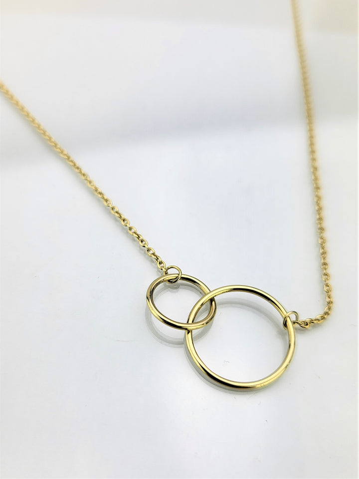 Elevate your style with our Fashion Circles 14k gold plated sterling silver necklace. Meticulously crafted with adjustable design.