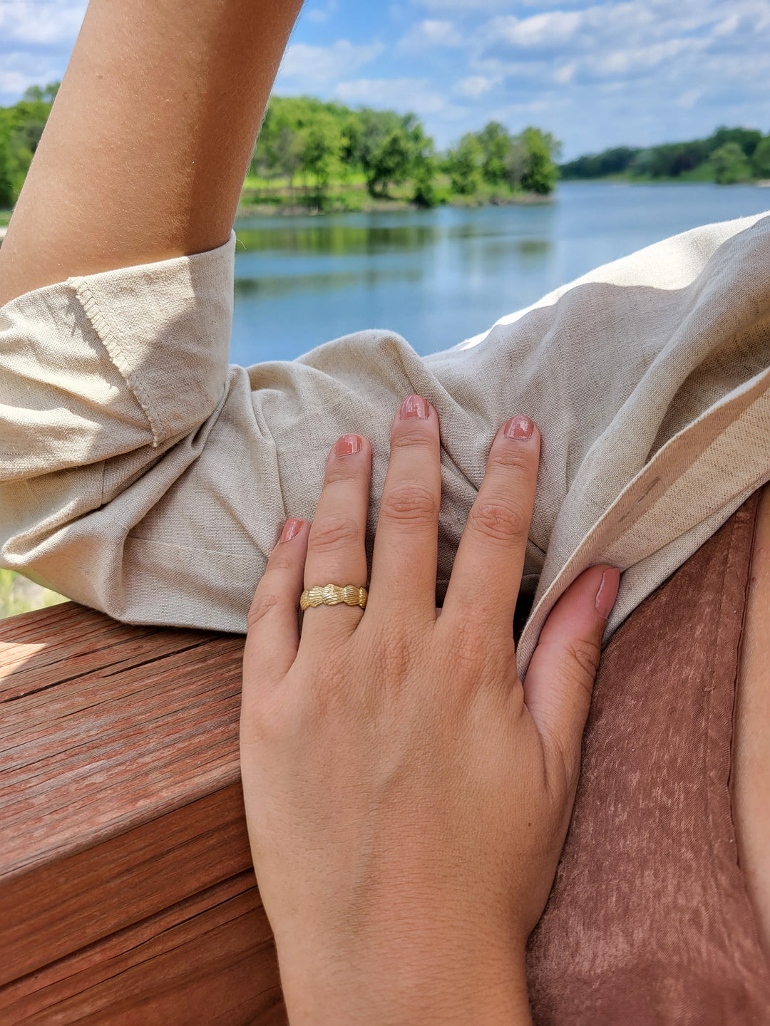 Indulge in the opulence of sun-kissed shores with this 14K gold plated sterling silver seashell ring. Exquisite.