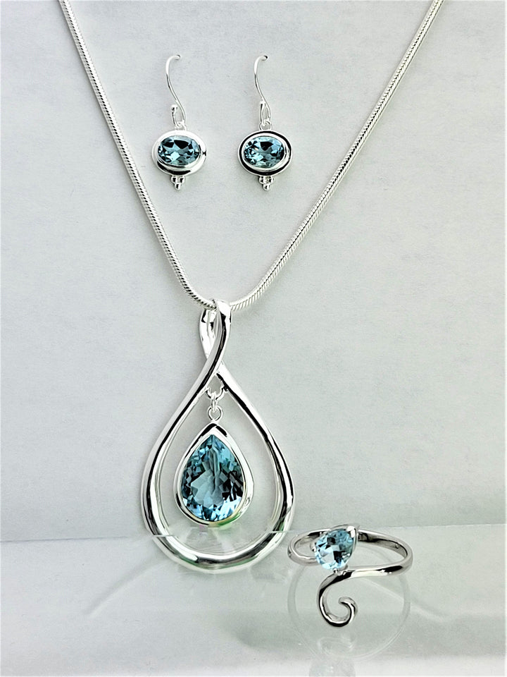 Complete your ensemble by pairing these earrings with our other sterling silver and sky blue topaz jewelry pieces, creating a harmonious symphony of elegance and refinement. Indulge in the luxurious allure of our collection, curated exclusively for the discerning connoisseur who appreciates the finer things in life.