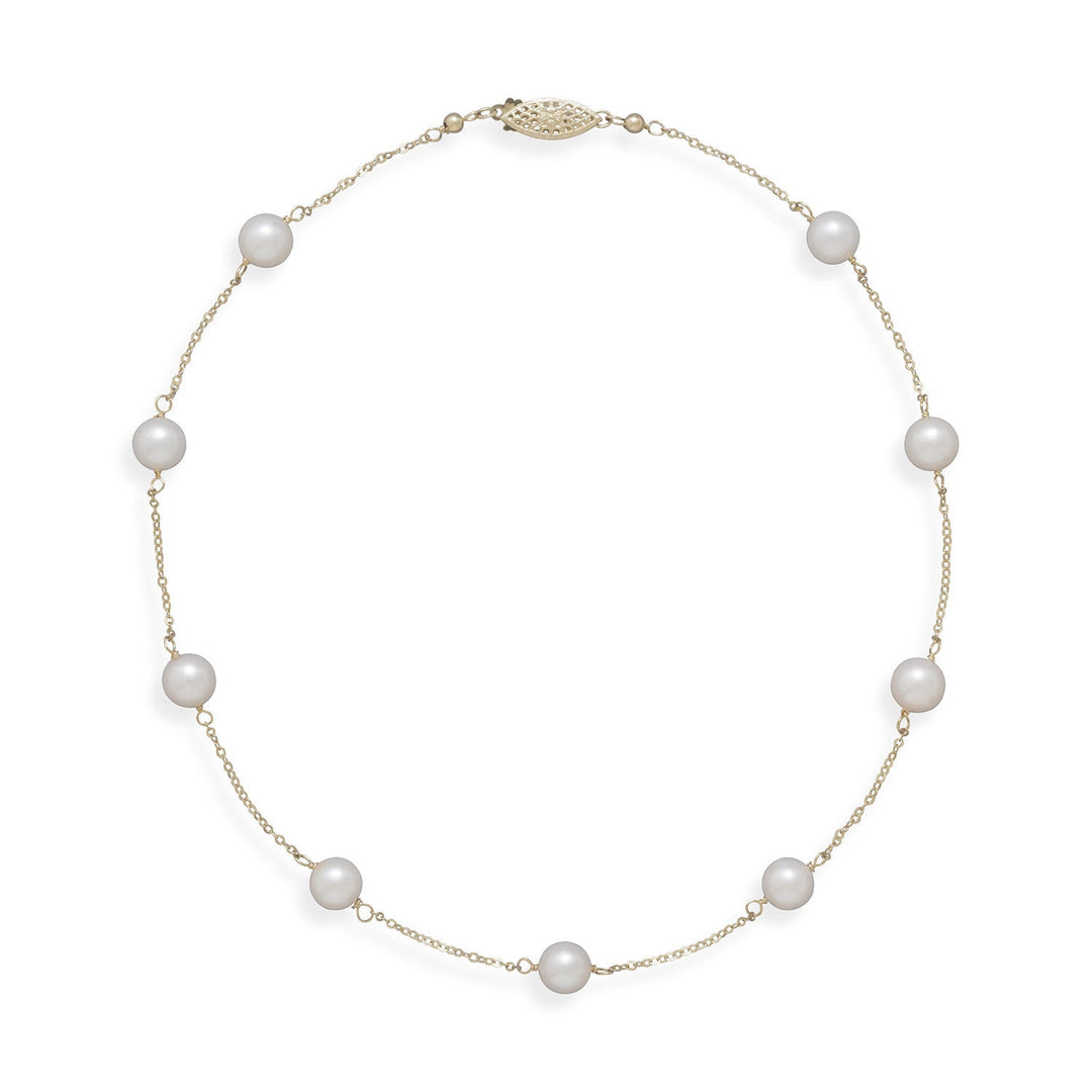 Introducing our exquisite 14kt gold cable chain necklace, adorned with nine 7mm cultured Akoya pearls. Immerse yourself in the allure of these rare gems, complemented by a filigree design pearl clasp. A timeless treasure, perfect for any cherished occasion.