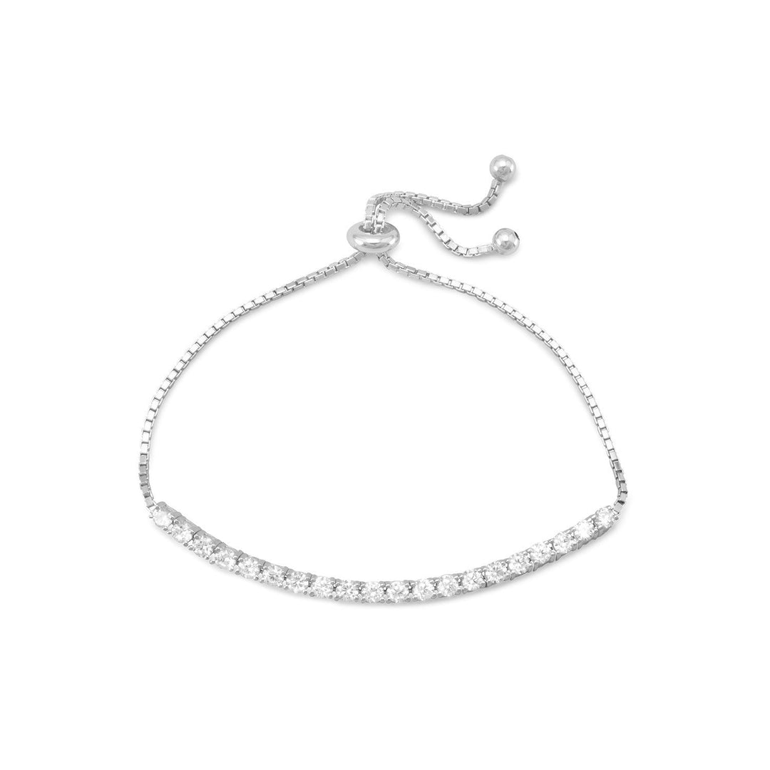 Introducing our exquisite adjustable rhodium plated sterling silver box chain bracelet, adorned with a dazzling 2.75" cubic zirconia bar. The rhodium plating ensures lasting brilliance, while the 3mm cubic zirconias exude unparalleled beauty and value. With the flexibility of a bolo feature, this bracelet is reminiscent of a tennis bracelet, offering a touch of elegance to any ensemble.