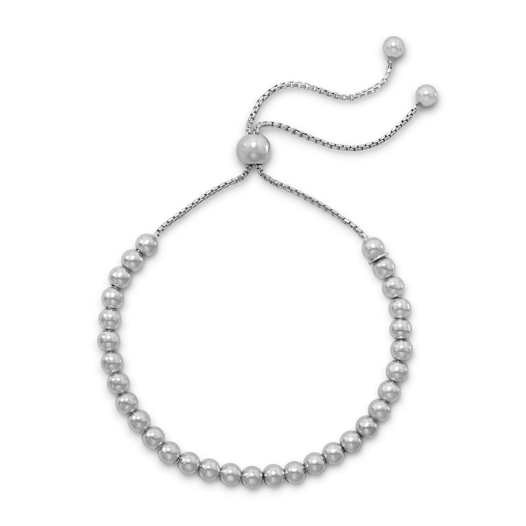 Indulge in the opulence of our Italian-made adjustable bolo bracelet. Rhodium plating over .925 sterling silver ensures lasting beauty, while 4mm round beads on a box chain add a touch of elegance. The bracelet adjusts with a sterling silver stopper bead, making it a perfect fit for any wrist. With its exquisite craftsmanship and timeless design, this bracelet is the ultimate gift for a loved one. Pair it with our other sterling silver jewelry pieces for a truly luxurious look.