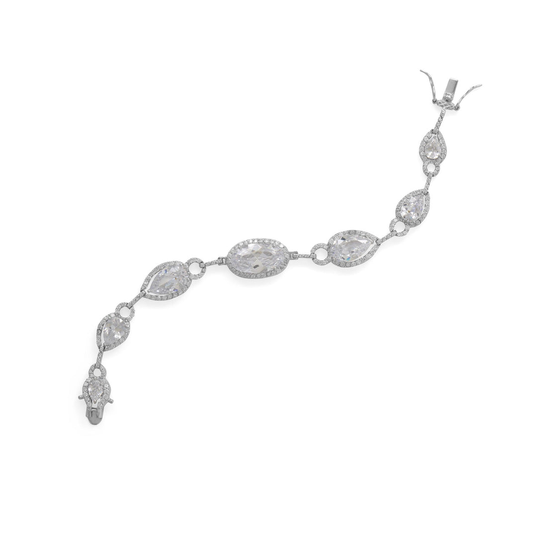 Simply gorgeous. Rhodium plated 7.5" sterling silver bracelet features 6 graduated pear shaped Cubic Zirconias and a large, central oval 10mm x 18mm Cubic Zirconia with halo Cubic Zirconia edge. Pear Cubic Zirconias measure 9mm x 14mm, 7mm x 10mm and 5mm x 7mm. Bracelet has a box clasp closure with double safety catches.. .925 Sterling Silver