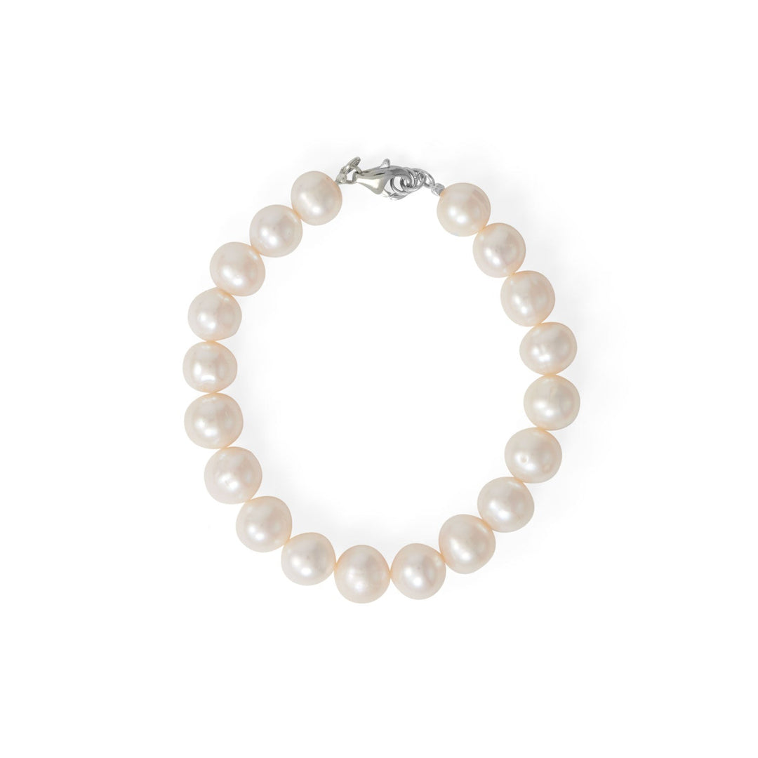 A bridal must-have. 8" rhodium plated sterling silver bracelet features 19 9.5mm cultured freshwater potato pearls and a lobster clasp closure.  .925 Sterling Silver 