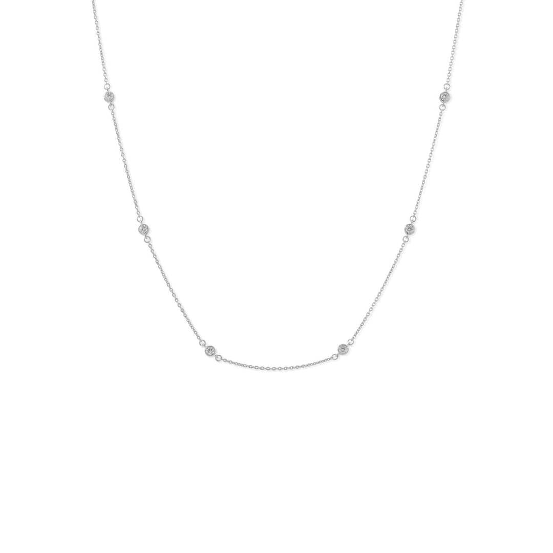 Introducing our exquisite 16"+2" rhodium plated sterling silver necklace, a perfect addition to your everyday jewelry collection. This necklace boasts a simplistic yet elegant design, featuring 4mm cubic zirconias nestled in sterling silver bezels.
