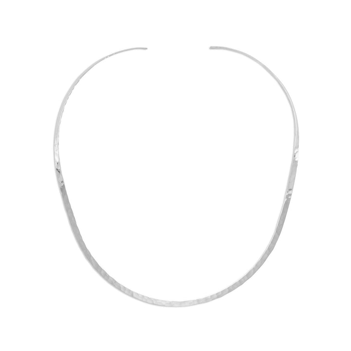 Indulge in the exquisite allure of this 3mm hammered open back collar necklace, crafted from .925 sterling silver. Its delicate weight will leave you feeling weightless, while its captivating design draws the gaze of all who behold it. Pair it with our other hammered sterling silver pieces for a truly luxurious look.