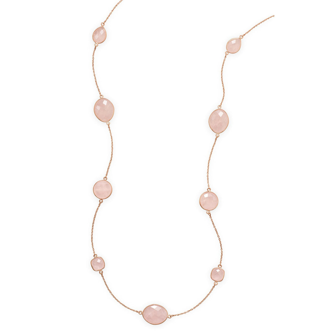 24" 14 karat rose gold plated sterling silver necklace with multishape faceted rose quartz. The pear shape quartz is 10mm x 15mm, the round quartz is 15mm, the soft square quartz is 11mm and the soft diamond shape quartz is approximately 16mm x 21mm. This necklace has a lobster clasp closure. .925 Sterling Silver