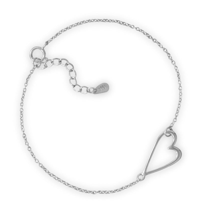 Indulge in the opulence of our 7" + 1" extension rhodium plated sterling silver sideways heart bracelet. The rhodium plating ensures longevity and radiance, while the 12mm x 18mm heart symbolizes love and passion. With a spring ring closure, this piece is a luxurious addition to any jewelry collection. Perfect for gifting to a cherished one, it pairs seamlessly with our other heart-themed jewelry pieces. Crafted from .925 sterling silver, this bracelet is a true statement of luxury.