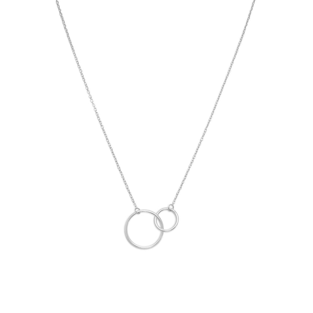 Introducing our exquisite 16" + 2" extension rhodium plated sterling silver necklace, featuring a small and large circle link center. The simplicity and beauty of the circles, measuring approximately 10mm and 16mm, are just enough to draw attention to the décolleté, making it a perfect accessory for any occasion.