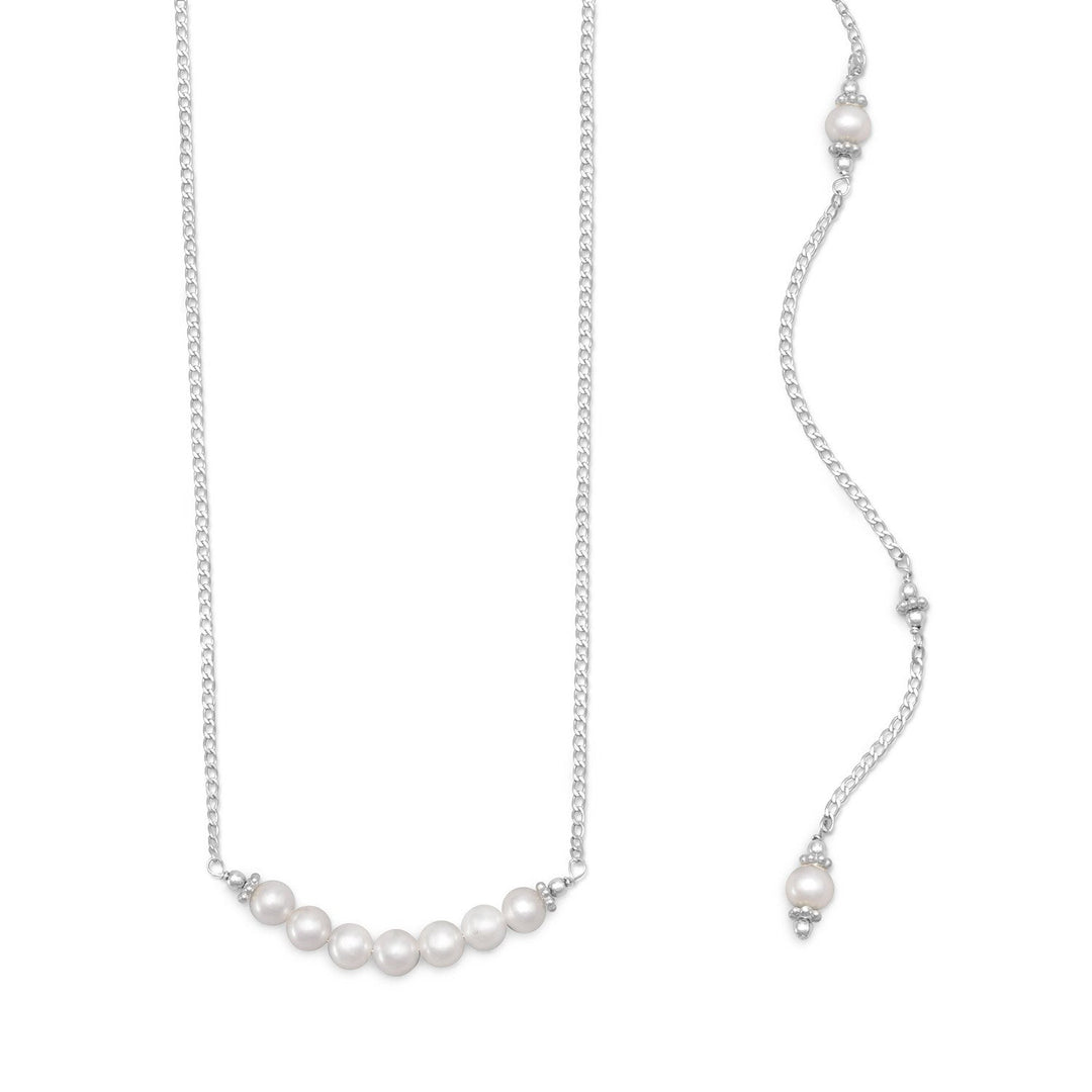 Bridal perfection. 15" sterling silver necklace with seven 5.5mm fine quality cultured freshwater pearls. The necklace features a 10" back drop embellished with three 5.5mm cultured freshwater pearls and sterling silver beads. This necklace has a spring ring closure. .925 Sterling Silver