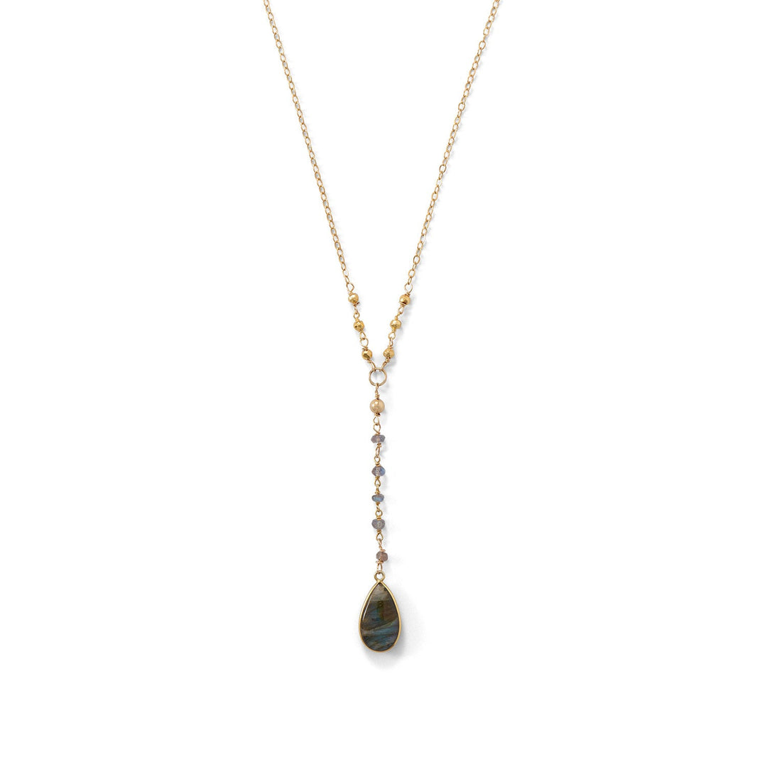 16" drop necklace with 14/20 gold-filled chain and 14 karat gold plated sterling silver wiring components. The necklace has 2.5-3mm faceted gold pyrite rondelle beads and a 2.5" drop which consists of 3.5-4mm faceted labradorite rondelle beads and a 10mm x 18mm pear-shaped labradorite stone. The necklace is finished with a spring ring closure.