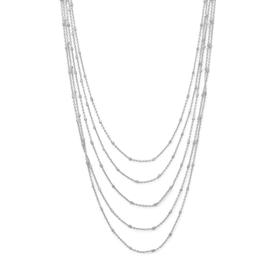 Introducing the Sparkle Queen, a mesmerizing masterpiece crafted in Italy. This exquisite necklace features a layered satellite chain, adorned with dazzling faceted beads that gracefully graduate from 16" to 20". The rhodium plating over sterling silver ensures longevity and radiance, while the delicate cable chain and bead stations add a touch of elegance. Complete with a lobster clasp closure, this accessory is a true symbol of luxury and sophistication.