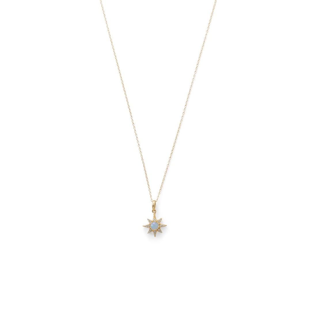 North star necklace. 16" with 2" extension in 14 karat gold plated sterling silver. CZ star measures 14.1mm x 20.5mm including bail and cradles a 4mm synthetic opal stone. On 1mm cable chain with lobster clasp closure. .925 Sterling Silver 