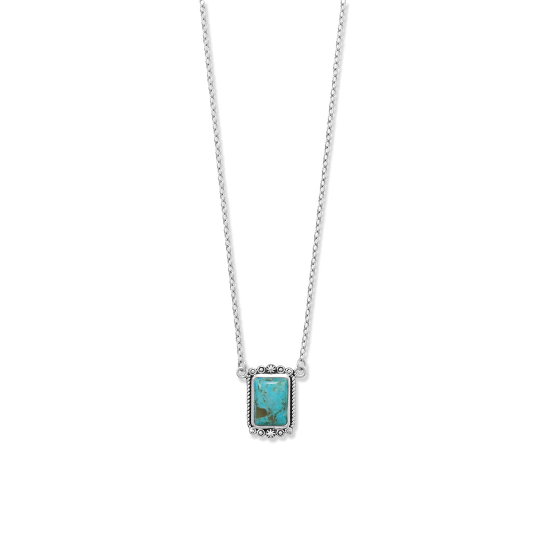 Experience the epitome of luxury with our exquisite 18" + 2" oxidized sterling silver necklace. Its captivating 10mm x 12mm reconstituted turquoise pendant, adorned with intricate rope and bead detailing, exudes timeless elegance. Meticulously crafted with .925 Sterling Silver, this masterpiece effortlessly enhances any ensemble. Complete your opulent look by pairing it with our stunning turquoise jewelry collection.