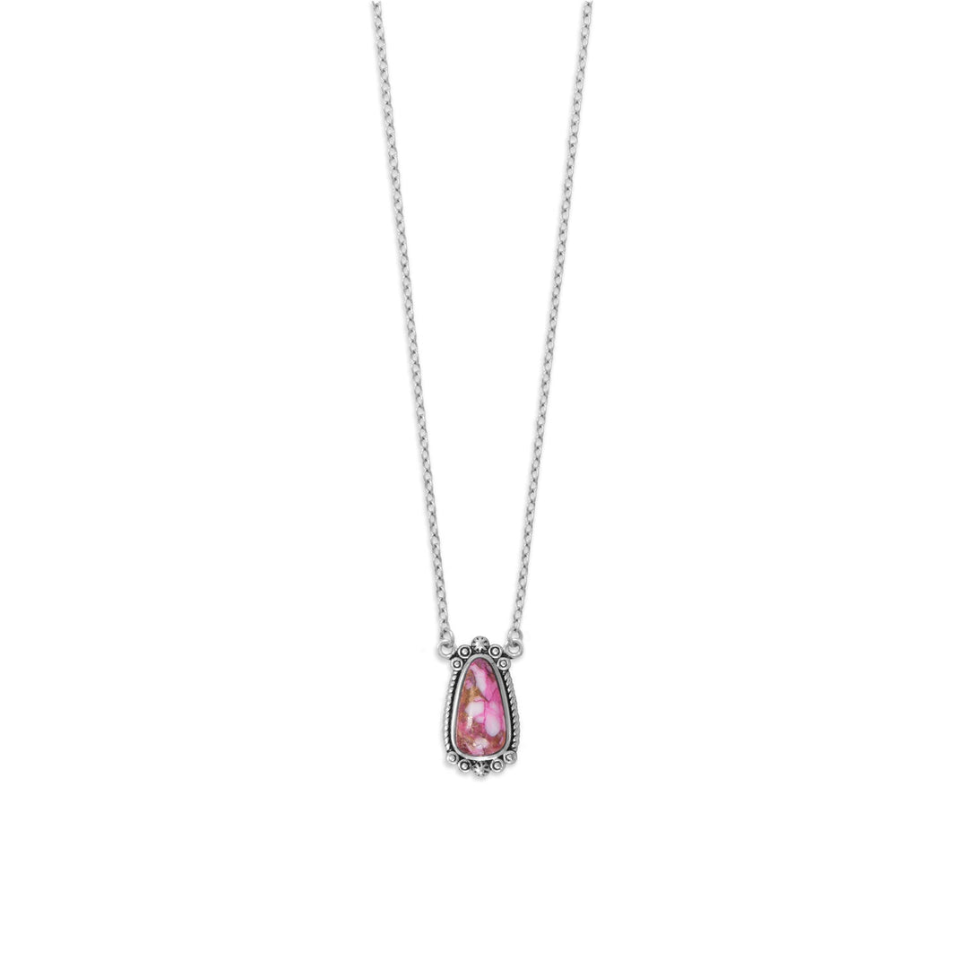 Pretty in pink! Indulge in the allure of pink with our exquisite 18" + 2" oxidized sterling silver necklace. Featuring a 14mm x 7mm compressed spiny oyster stone pendant, adorned with intricate rope and bead detailing. Finished with a .925 sterling silver spring ring closure, this piece is a must-have for any discerning fashionista.