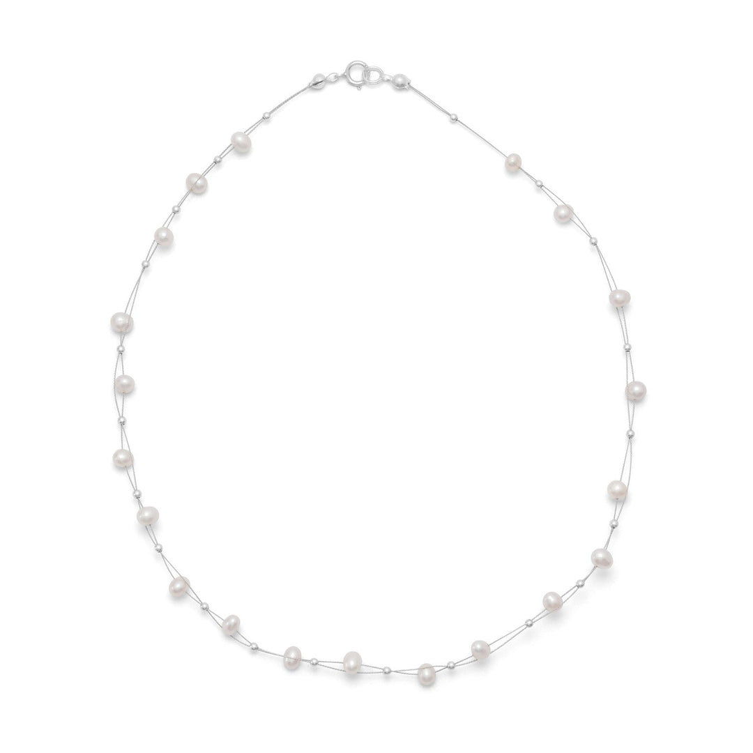 Introducing our stunning necklace, featuring 2mm silver beads and 5mm cultured freshwater pearls. The classic beauty and value of the pearls are showcased in two interwined strands, paired with .925 sterling silver. Perfect for gifting to a loved one, bride, or bridesmaids.