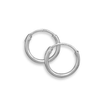 Introducing our exquisite 10mm endless hoop earrings, crafted from premium .925 sterling silver. These earrings exude a timeless charm with their simple yet elegant design. The endless hoop style ensures utmost security, allowing you to wear them with confidence and ease. The lightweight construction of these dainty earrings makes them comfortable to wear for extended periods, while their shiny finish adds a touch of sophistication to any outfit.