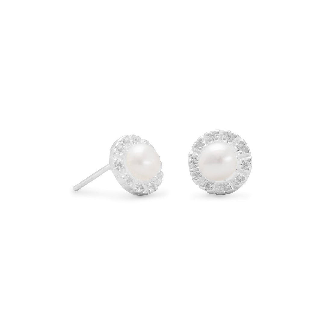 Sterling silver and cultured freshwater pearl stud earrings. The pearls are approximately 5mm and surrounded with a halo of clear Cubic Zirconias. .925 Sterling Silver. These earrings pair perfectly with our other stunning sterling silver cubic zirconia and pearl jewelry collection.