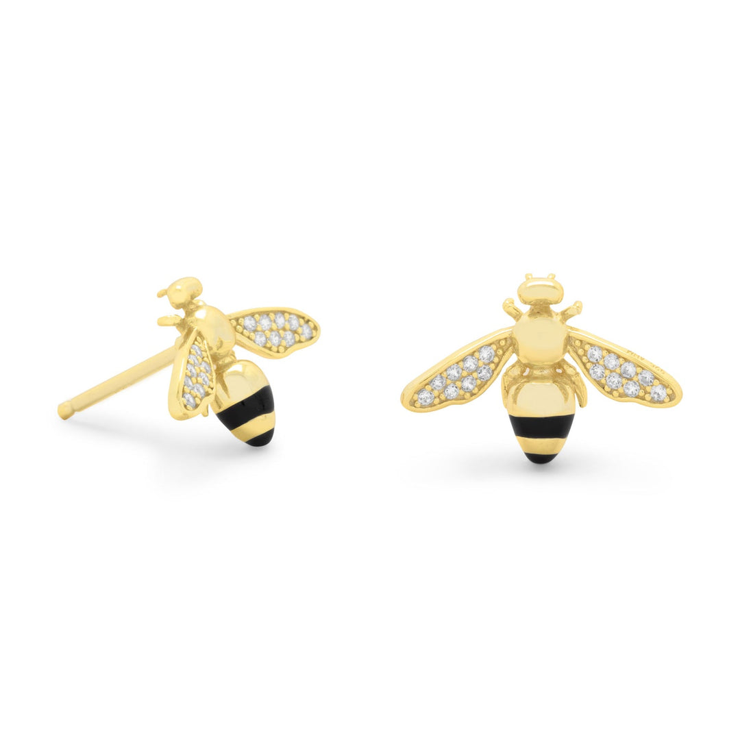 Introducing our exquisite product, the Adorable 14 Karat Gold Plated Sterling Silver and Signity CZ Bee Stud Earrings. The bee's wings are adorned with Signity CZs, adding a touch of elegance and sophistication to the overall look. The Signity Cubic Zirconias used in these earrings are of the highest quality and are known for their brilliance and clarity. The bees measure approximately 11mm x 16.5mm.