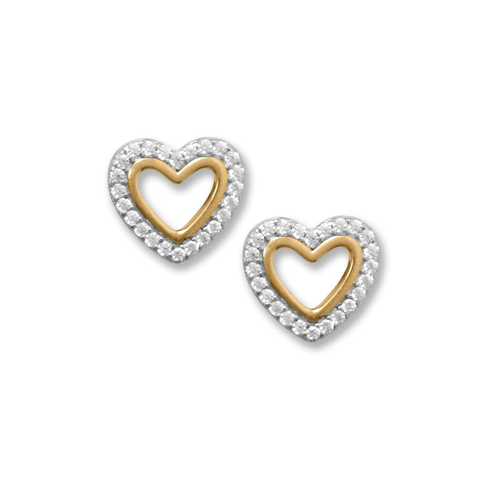 Introducing our exquisite Sweet Halo Heart Studs, a stunning addition to any jewelry collection. These stud earrings are crafted from high-quality .925 sterling silver and feature a beautiful heart outline design adorned with sparkling cubic zirconias. The rhodium plating and 14 karat gold plated accents add a touch of luxury and sophistication to these already elegant earrings.The size of the earrings, measuring 10mm x 9mm, is perfect for making a statement and drawing attention to your ears and face.