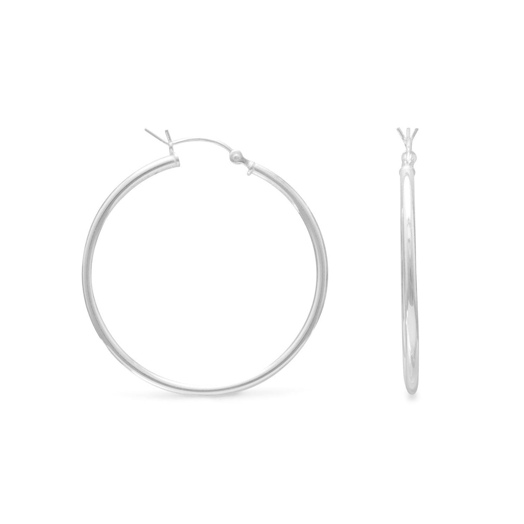 Introducing our exquisite 2mm x 35mm hoop earrings with click hoop closure, crafted from premium .925 Sterling Silver. These earrings are designed with ease of use in mind, featuring a convenient click hoop closure that ensures a secure fit.