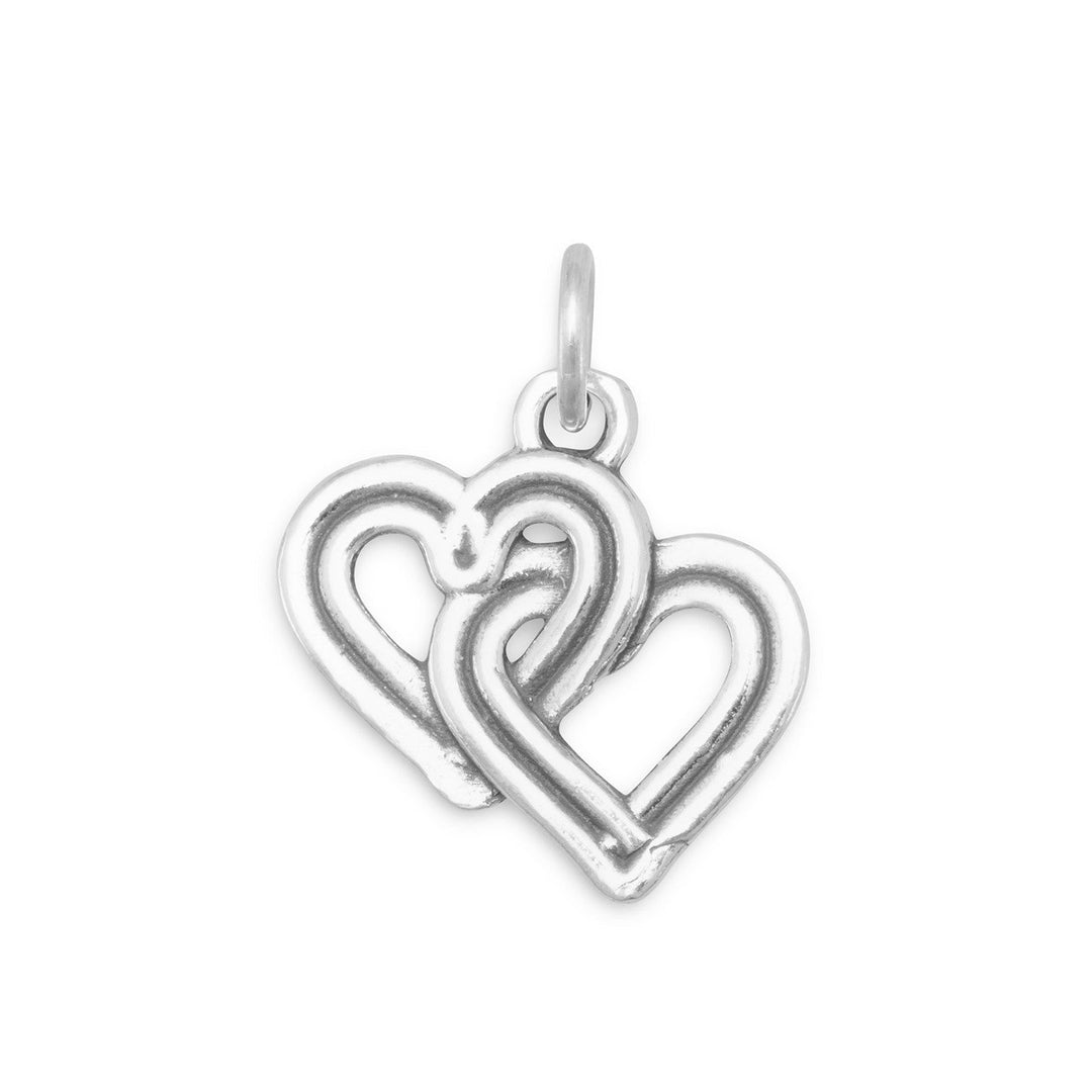 Reversible Interwoven Sterling Silver Hearts Charm, Charm measures 18x18mm. .925 Sterling Silver