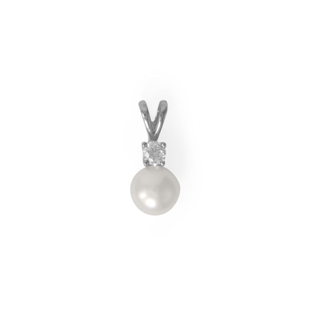 This exquisite pendant boasts a 3mm Cubic Zirconia layered on a 6.5mm cultured freshwater pearl, creating a dazzling sparkle that is sure to catch the eye.The 6.5mm cultured freshwater pearl featured in this pendant is a testament to its quality and sophistication. With a total hanging length of approximately 14.5mm, this pendant is the perfect size to pair with any of our sterling silver necklaces. 