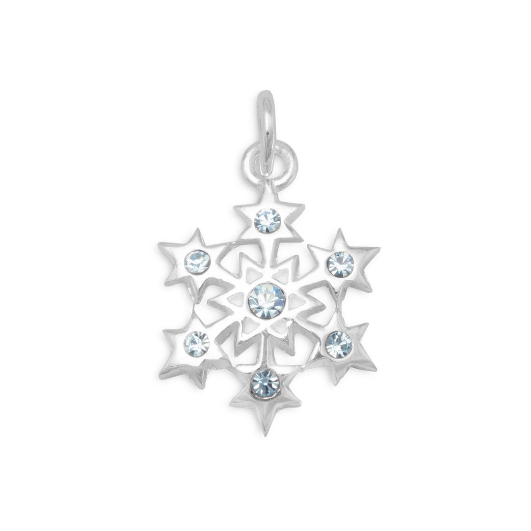 Introducing our exquisite Sterling Silver Snowflake Charm, a stunning piece of jewelry that is sure to captivate your senses. Crafted from .925 sterling silver, this charm measures 11mm  Features six 1.4mm clear crystals and one 2mm aqua blue crystal, creating a shimmering effect that is both elegant and eye-catching.
