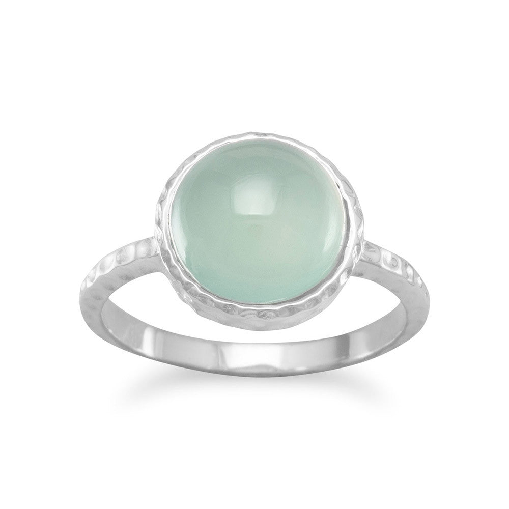 Introducing our exquisite sterling silver ring, adorned with a mesmerizing 10mm cabochon sea green chalcedony stone. Its ethereal beauty is enhanced by the delicate texture of the 1mm band, crafted from .925 sterling silver. Elevate your style with this luxurious masterpiece.