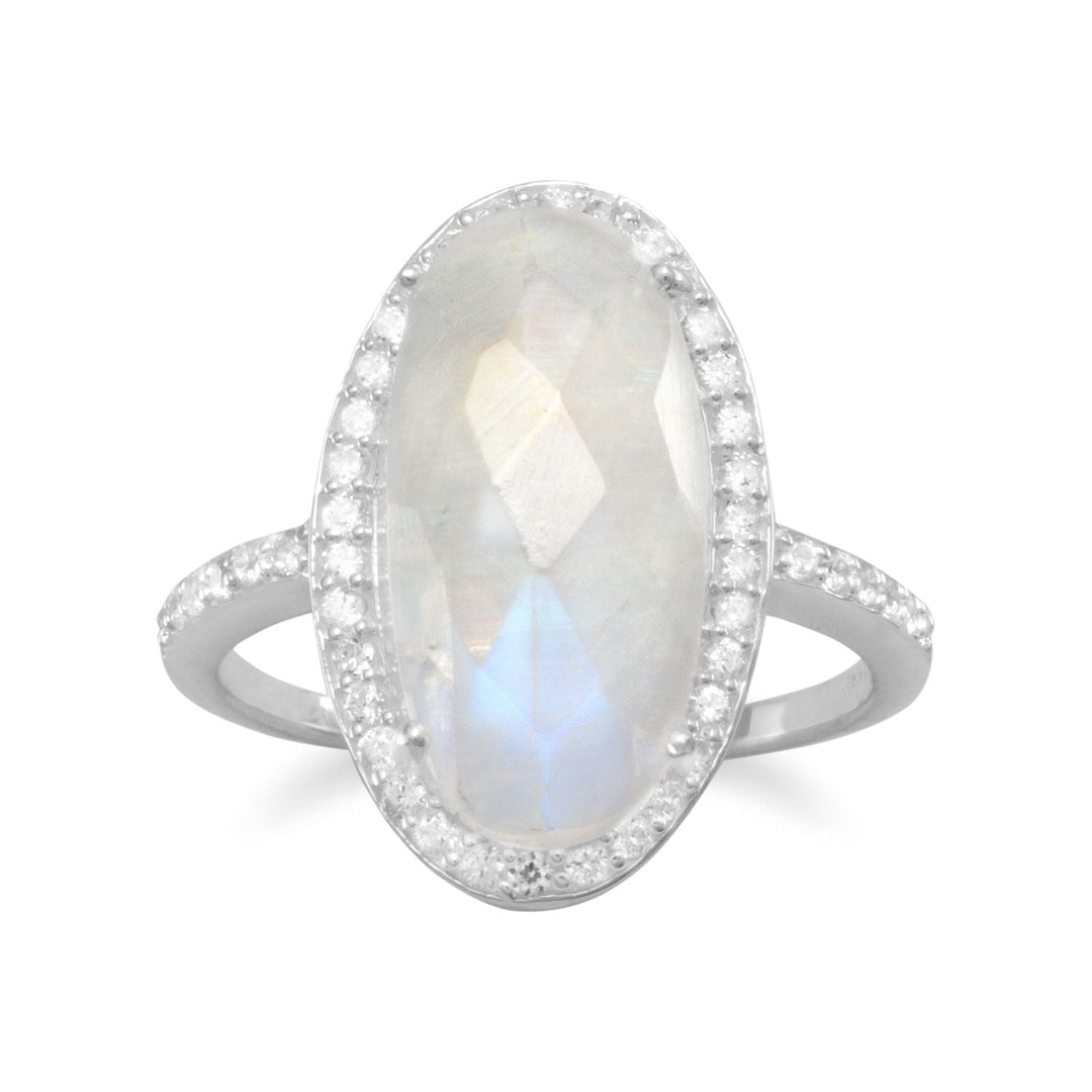 Introducing our exquisite sterling silver ring adorned with a mesmerizing 8mm x 17mm faceted rainbow moonstone. Its captivating cubic zirconia edge effortlessly captures light, while the delicate 1mm band showcases cubic zirconias on its upper half. Crafted with .925 sterling silver, this enchanting ring perfectly complements our stunning rainbow moonstone jewelry collection.