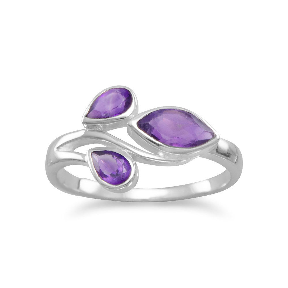 Indulge in the luxurious elegance of this sterling silver ring, adorned with two exquisite pear amethysts measuring 3mm x 5mm and a stunning marquise amethyst measuring 4.5mm x 8mm. The band, approximately 1.5mm in width, adds a delicate touch to this already breathtaking piece. Crafted from .925 sterling silver, this ring is a true statement of sophistication and refinement. Elevate any outfit with this stunning accessory, perfect for any occasion.