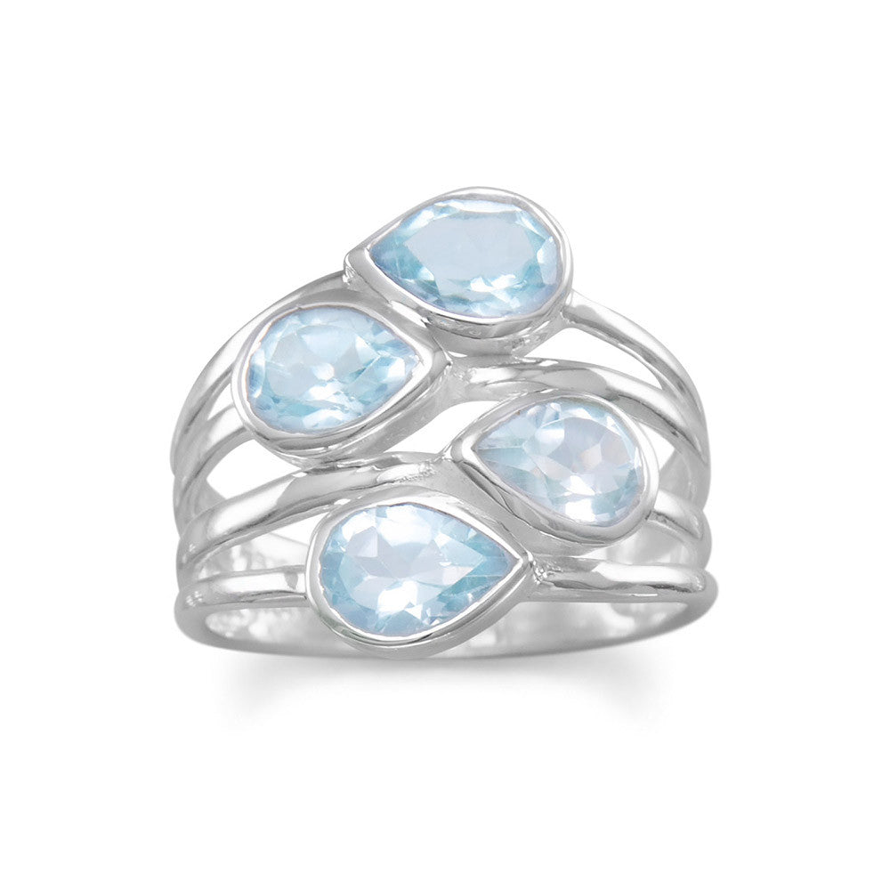 Experience the epitome of luxury with our sterling silver multi row ring. Adorned with four exquisite pear blue topaz stones, the polished silver enhances their clear blue beauty. Measuring approximately 5.5mm x 8mm, this statement piece boasts a front width of 17mm and a tapered back of 2mm. Crafted from .925 sterling silver, it exudes elegance and sophistication. Pair it with any of our topaz and sterling jewelry collection pieces for a truly opulent and lavish look.