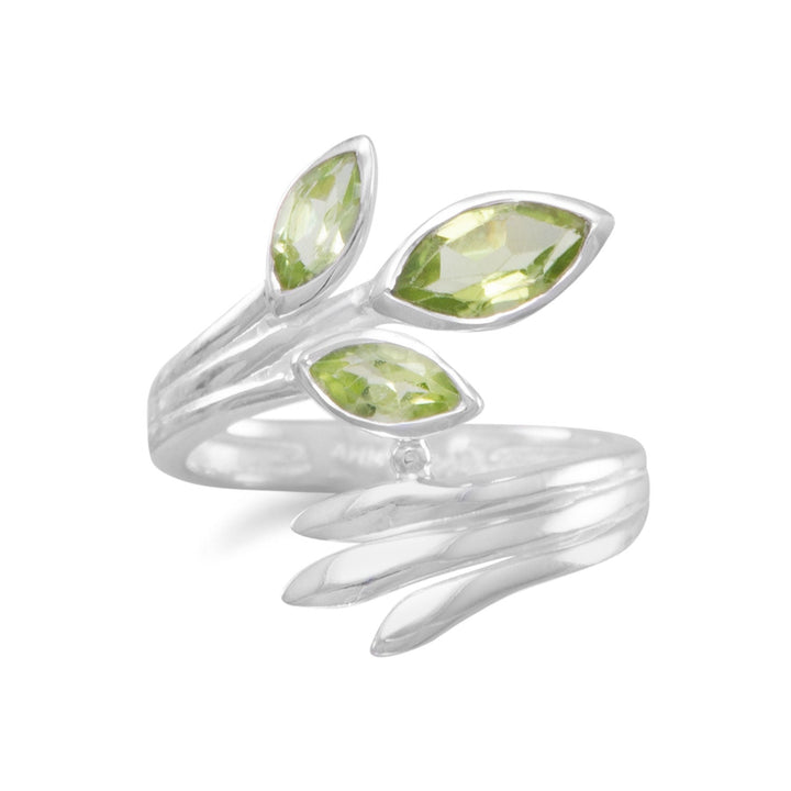 Experience the epitome of luxury with our Sterling Silver Fan Wrap Ring, featuring three exquisite marquise peridots. The intricate leaf fan design exudes unparalleled femininity, while the polished silver accentuates the mesmerizing beauty of the stones. With a band that tapers from 30mm to 2mm, this ring ensures a comfortable and elegant fit. Elevate your style by pairing it with our other sterling silver and peridot jewelry pieces, creating a complete and opulent look.