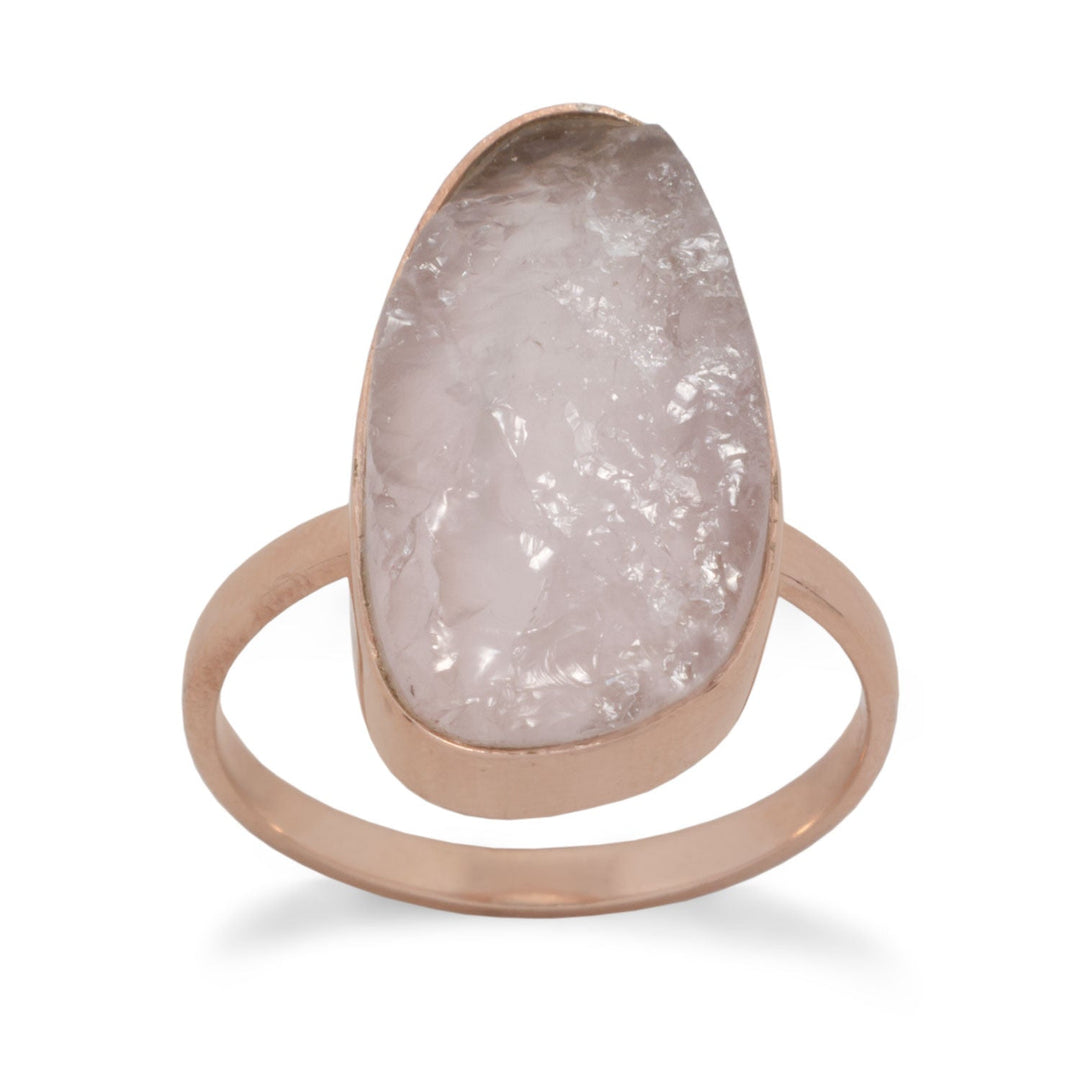 Introducing our exquisite masterpiece, the epitome of elegance and opulence. Behold the resplendent allure of our Roses Roses Everywhere ring. Crafted with utmost precision, this 14 karat rose gold plated sterling silver ring showcases a mesmerizing 10mm x 21mm rough cut rose quartz stone. Available in whole sizes 5-9, this divine creation is adorned with a delicate 2mm band. Immerse yourself in the luxurious embrace of this .925 sterling silver treasure.