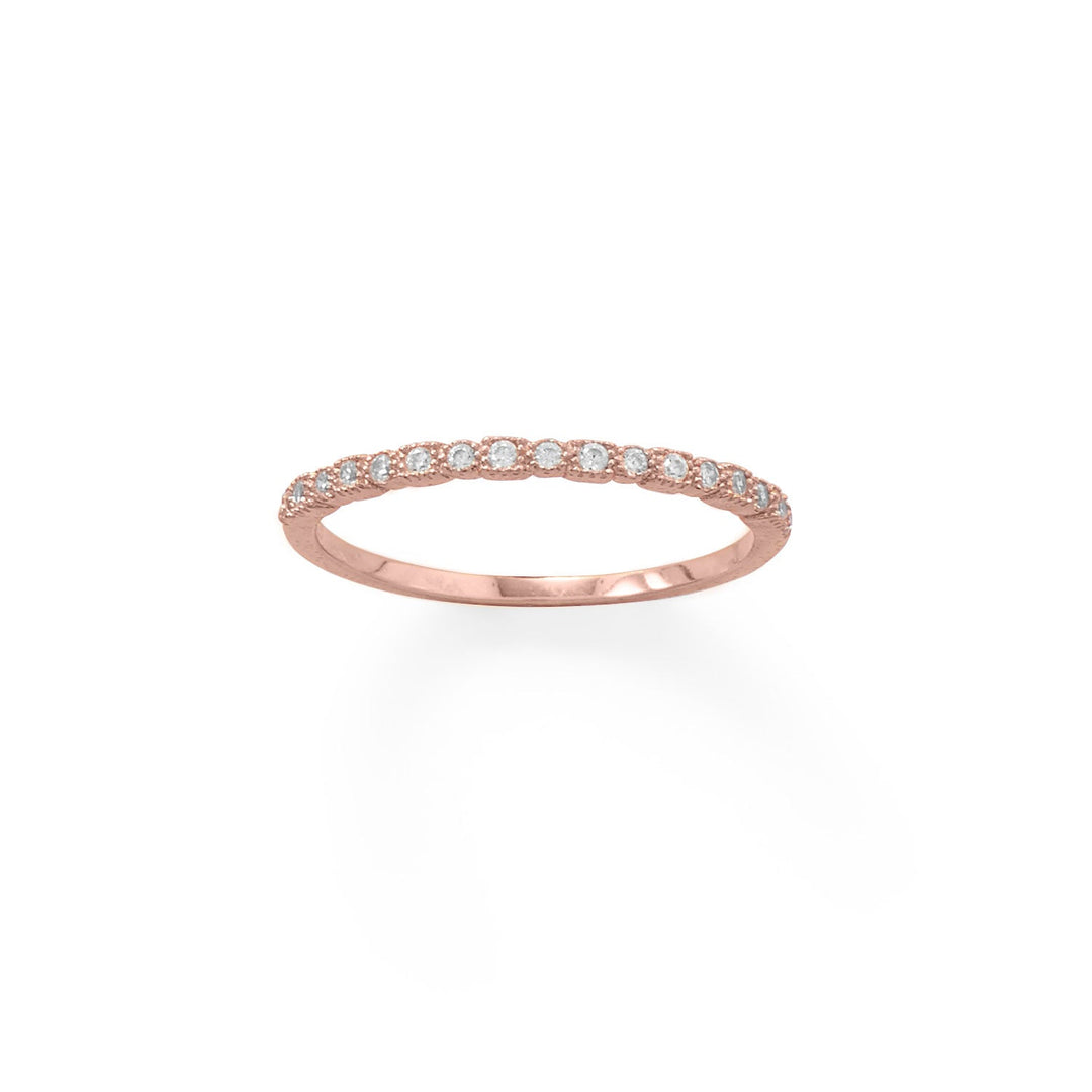 Indulge in the opulence of our 14 karat rose gold plated sterling silver ring, adorned with 17 exquisite 1.25mm cubic zirconias. Perfect for stacking or as a midi ring, this piece boasts a tapered band of 1.5mm, tapering down to 1.2mm. Available in whole sizes 3-9, this ring is a true testament to the beauty and value of .925 sterling silver.