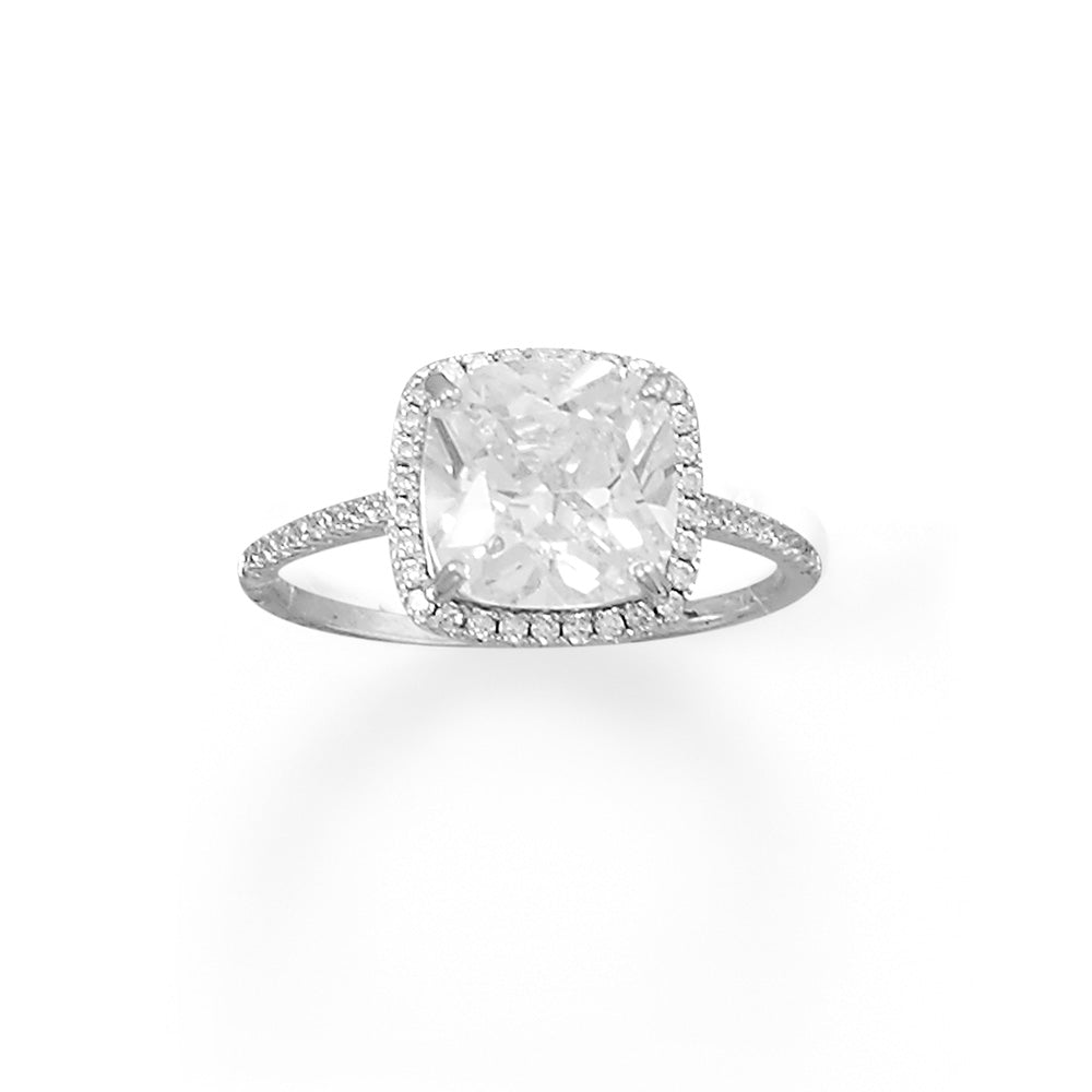Indulge in the opulence of our Rhodium plated sterling silver ring, adorned with a magnificent square cushion cut cubic zirconia. The center stone, measuring approximately 9mm x 9mm, is encircled by a halo of sparkling cubic zirconias, creating a breathtaking display of radiance. Available in whole sizes 5-10, this ring is crafted from .925 sterling silver, ensuring both beauty and durability. Elevate your style with this luxurious piece.