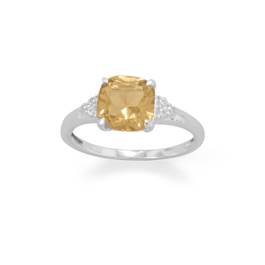 Experience the ultimate in luxury with our sterling silver band, featuring a stunning CZ that embraces an 8mm x 8mm cushion cut citrine stone. The band tapers to a delicate 1.5mm, adding a touch of refinement to this already exquisite piece. Made from .925 sterling silver, this ring is available in whole sizes 6-9, making it the perfect addition to any jewelry collection. Elevate your style with this stunning statement piece.