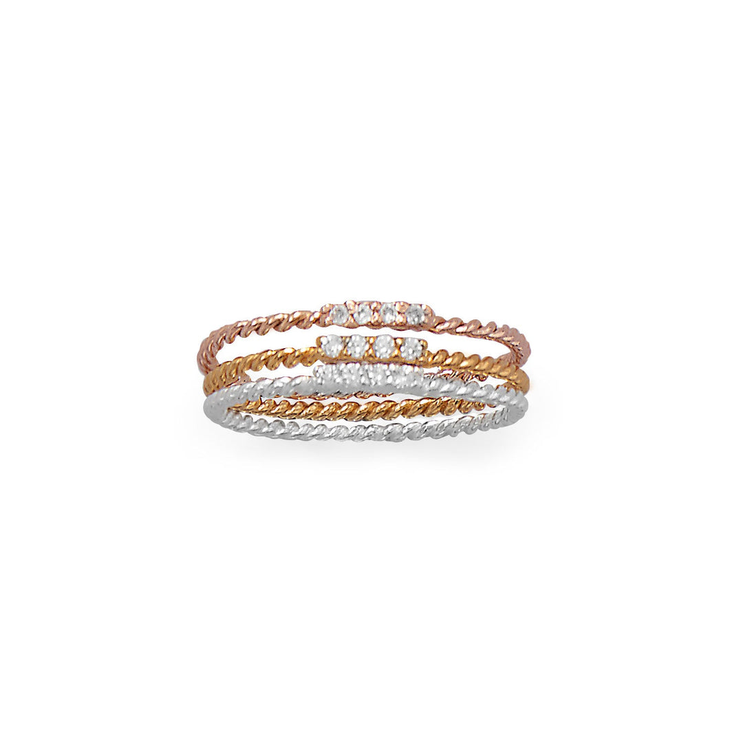 Introducing the exquisite charm of our darling stacking ring set. Crafted with utmost precision, this set boasts a sterling silver band, a 14 karat gold plated sterling silver band, and a 14 karat rose gold plated sterling silver band. Adorned with (4) 1mm cubic zirconias atop each band, this luxurious ensemble exudes elegance. Each band measures 1.5mm wide, ensuring a comfortable fit. Available in whole sizes 4-9, this .925 sterling silver set is the perfect gift for your beloved.