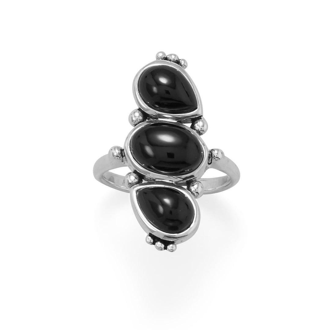 Sterling silver holds three black onyx pieces in place to create this ring. Center oval stone measures 10mm x 7mm, and the accent pear stones measures 9mm x 6mm. Bands measures 2mm. Available in whole sizes 6-9. .925 Sterling Silver 