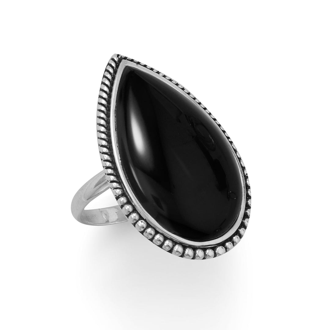 Introducing our stunning black onyx ring! Crafted with oxidized sterling silver, it features a large pear-shaped black onyx stone, exuding elegance and value. With a 2.5mm wide band, this ring is available in sizes 6-10. Complete your look with our matching black onyx jewelry pieces. Made with .925 sterling silver.