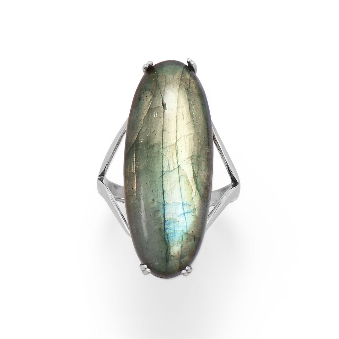 Make a statement with this stunning ring! Sterling silver ring features a large oval shaped labradorite in the center. Stone measures 30mm x 12mm. Band measures 2mm wide. Available in whole sizes 6-10.  