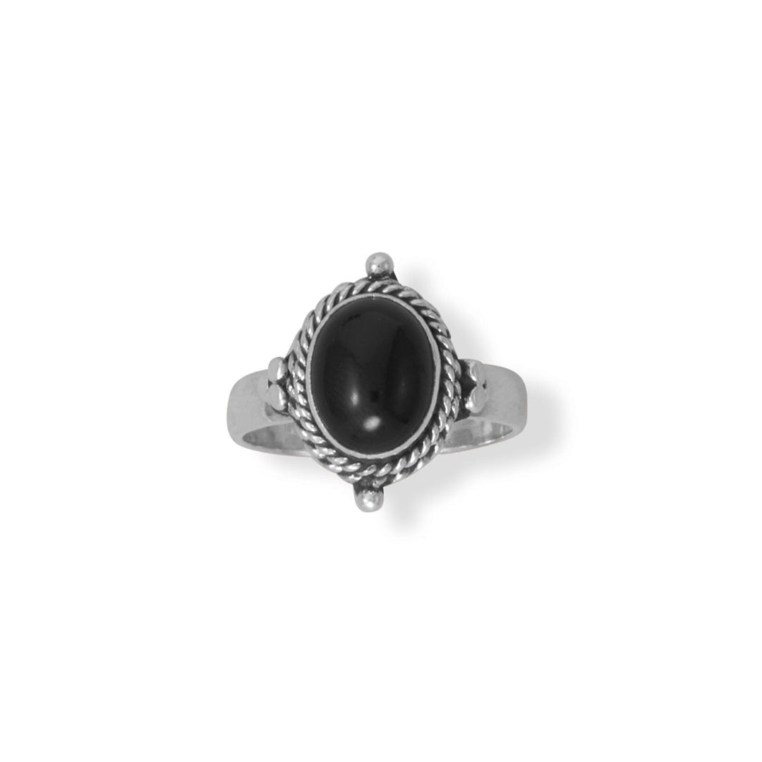 Unleash your inner rebel with our BACK IN BLACK ring! Handcrafted in Bali, this oxidized sterling silver ring features a stunning 9.8mm x 7.5mm black onyx, hugged by a rope edge. Available in sizes 5-9, this bold statement piece pairs perfectly with our other black onyx jewelry. Get yours now and embrace the beauty and value of this exotic gemstone