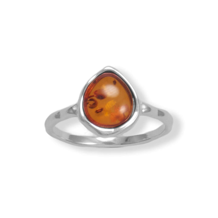 Experience the epitome of luxury with our exquisite sterling silver ring, featuring a rare Baltic amber from Poland. The pear-shaped gem is perfectly complemented by a hammered texture band, creating a timeless piece for the refined connoisseur. Pair with our other sterling silver and Baltic Amber jewelry for a truly opulent look.