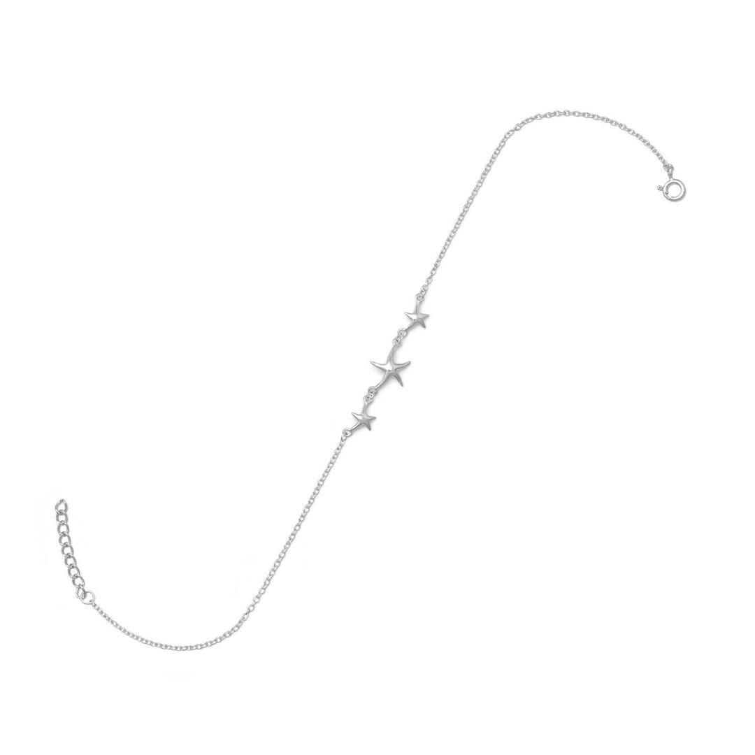 Introducing the exquisite 9" + 1" extension rhodium plated sterling silver anklet with three polished starfish. This anklet is crafted from the finest .925 sterling silver, ensuring its durability and longevity. The anklet measures 9" in length, with an additional 1" extension, allowing for a comfortable and adjustable fit.