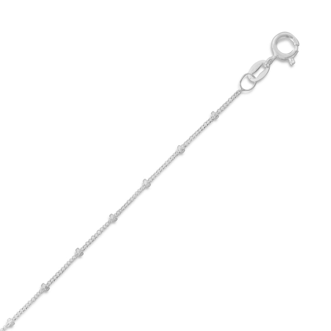 Introducing our stunning .925 Sterling Silver 1.5mm Satellite Chain Anklet! The unique satellite chain design sets it apart, adding beauty and simplicity to any outfit. Pair it with our other sterling silver satelite jewelry for a complete look. Made in Italy with a spring ring closure, this anklet is the perfect gift for any man or woman.. Made in Italy, this anklet is a testament to the timeless beauty and quality of Italian jewelry.