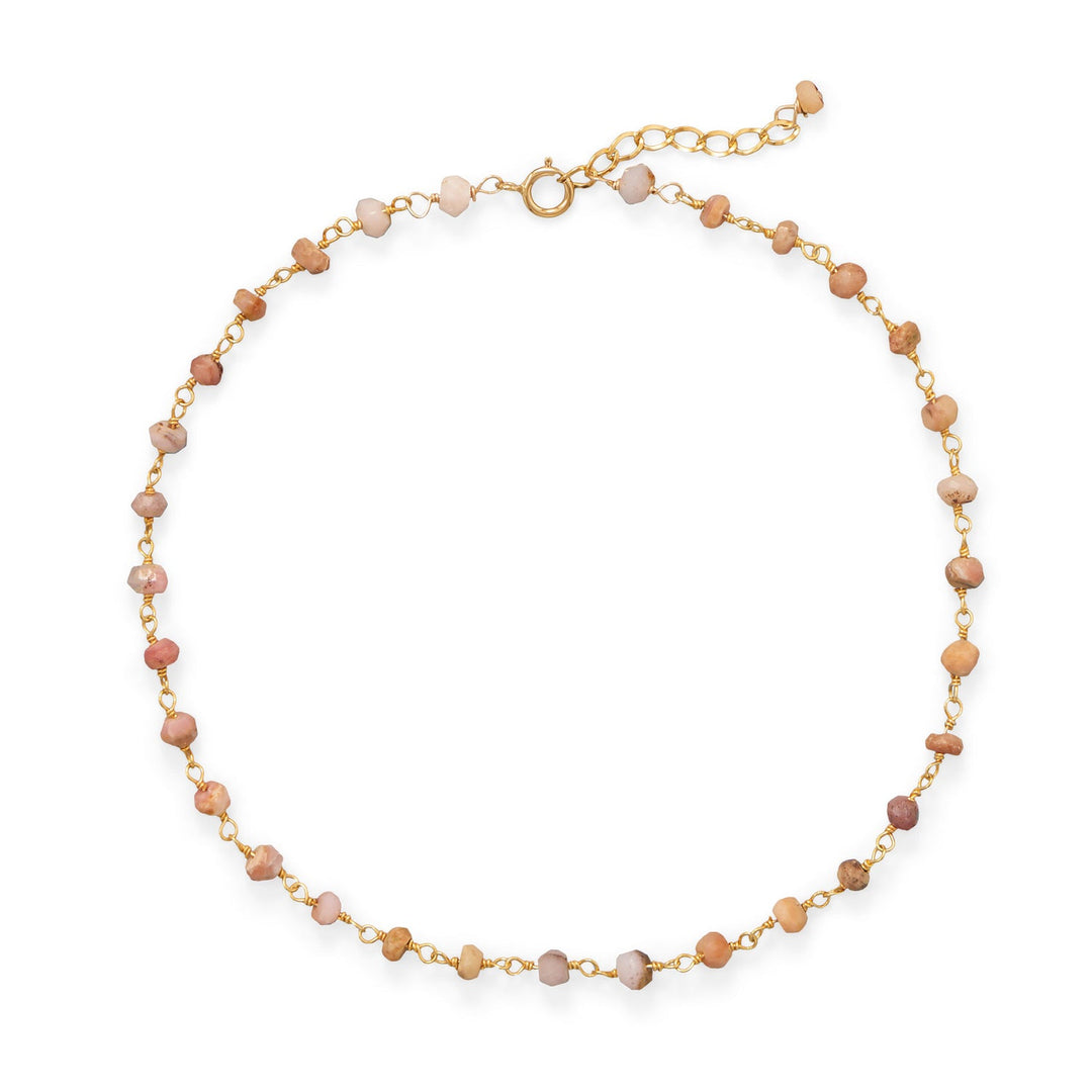 Pretty in pink anklet! 9.5" anklet with a 1" extension. 14 karat gold plated sterling silver chain features pink opal rondells measuring 2.5mm x 3.5mm. Spring ring and extension chain are 14/20 gold filled.  .925 Sterling Silver and 14/20 Gold Filled